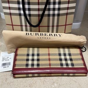 Burberry continental wallet in red check